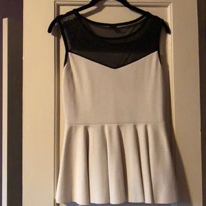 Black & cream colored peplum top - size M